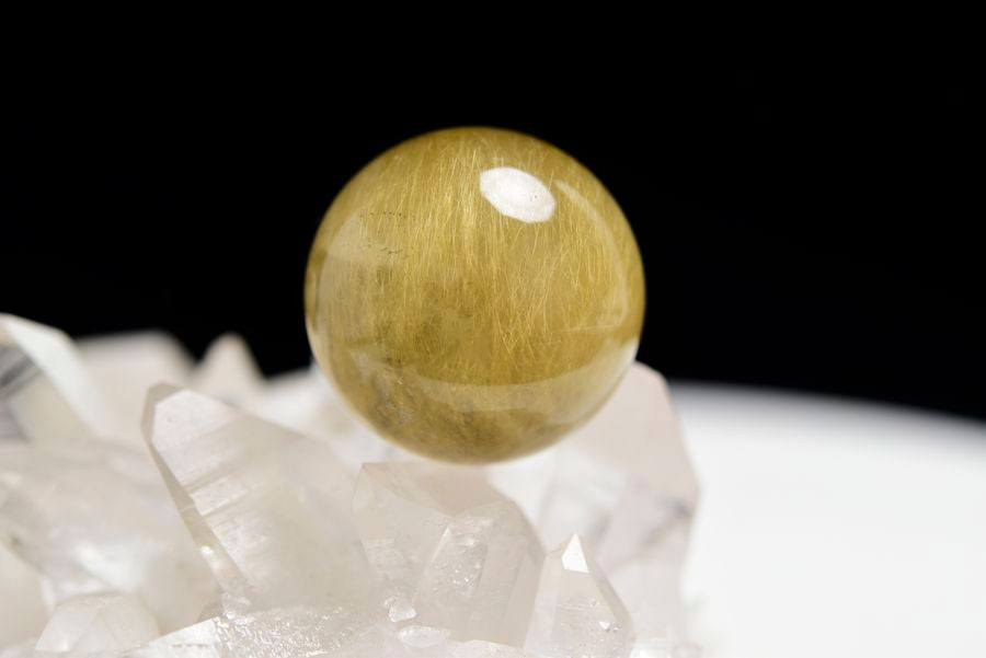 ゴールドルチル　ルチルクォーツ　金針水晶　丸玉　穴なし　金運　財運　スフィア　天然石　パワーストーン