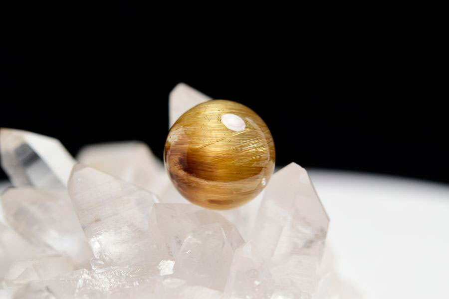 ゴールドルチル　ルチルクォーツ　金針水晶　丸玉　穴なし　金運　財運　スフィア　天然石　パワーストーン