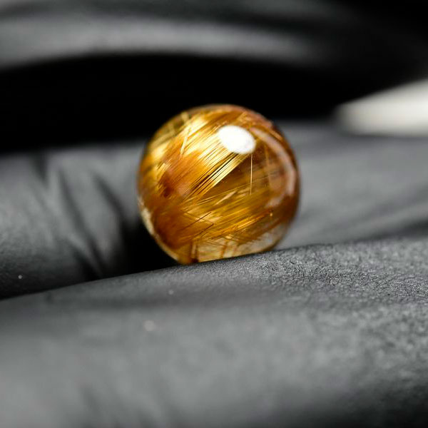 ゴールドルチル　ルチルクォーツ　金針水晶　丸玉　穴なし　金運　財運　スフィア　天然石　パワーストーン