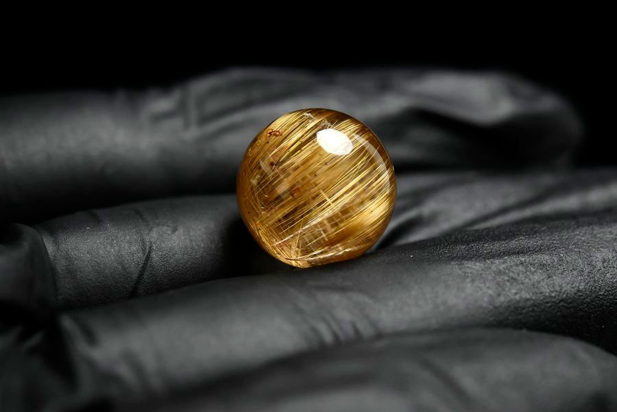 ゴールドルチル　ルチルクォーツ　金針水晶　丸玉　穴なし　金運　財運　スフィア　天然石　パワーストーン