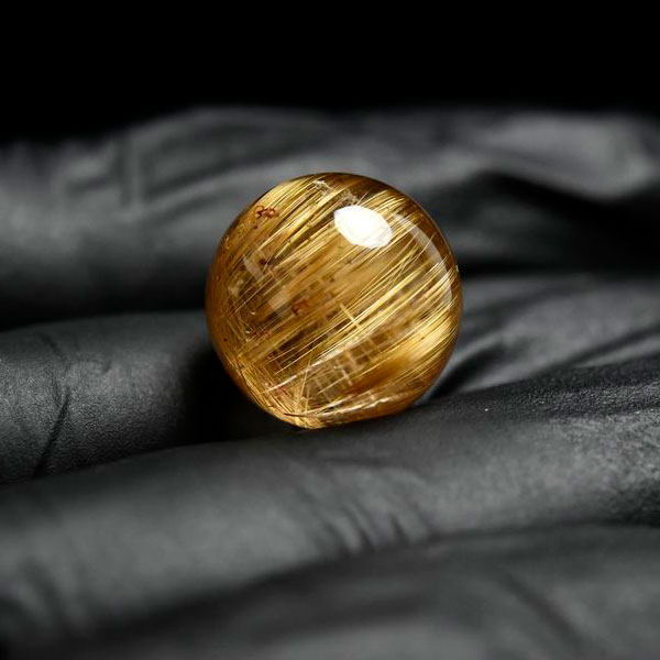 ゴールドルチル　ルチルクォーツ　金針水晶　丸玉　穴なし　金運　財運　スフィア　天然石　パワーストーン