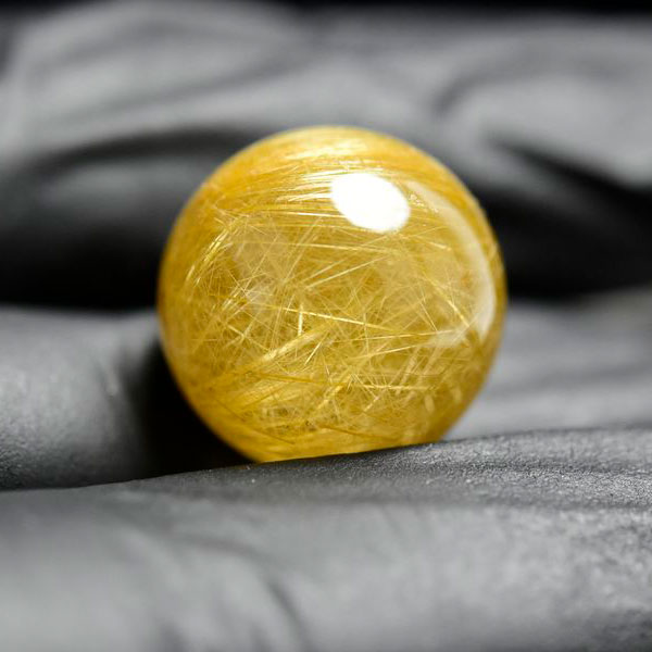 ゴールドルチル　ルチルクォーツ　金針水晶　丸玉　穴なし　金運　財運　スフィア　天然石　パワーストーン