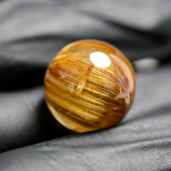ゴールドルチル　ルチルクォーツ　金針水晶　丸玉　穴なし　金運　財運　スフィア　天然石　パワーストーン