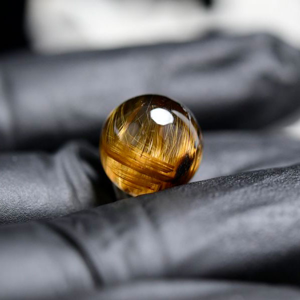 ゴールドルチル　ルチルクォーツ　金針水晶　丸玉　穴なし　金運　財運　スフィア　天然石　パワーストーン