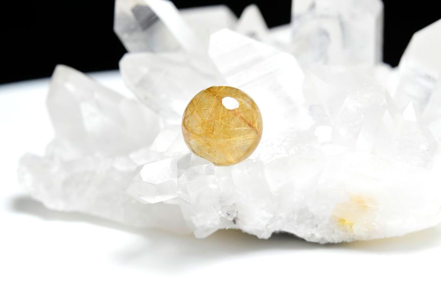 ゴールドルチル　ルチルクォーツ　金針水晶　丸玉　穴なし　金運　財運　スフィア　天然石　パワーストーン
