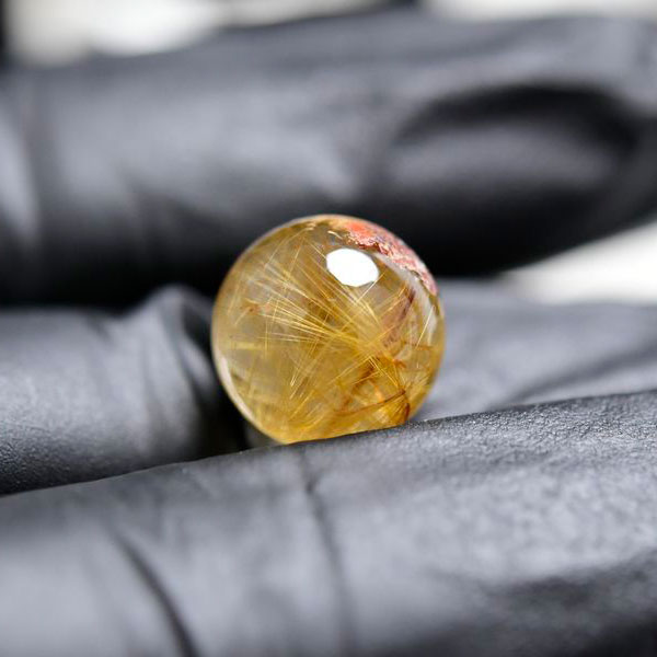 ゴールドルチル　ルチルクォーツ　金針水晶　丸玉　穴なし　金運　財運　スフィア　天然石　パワーストーン