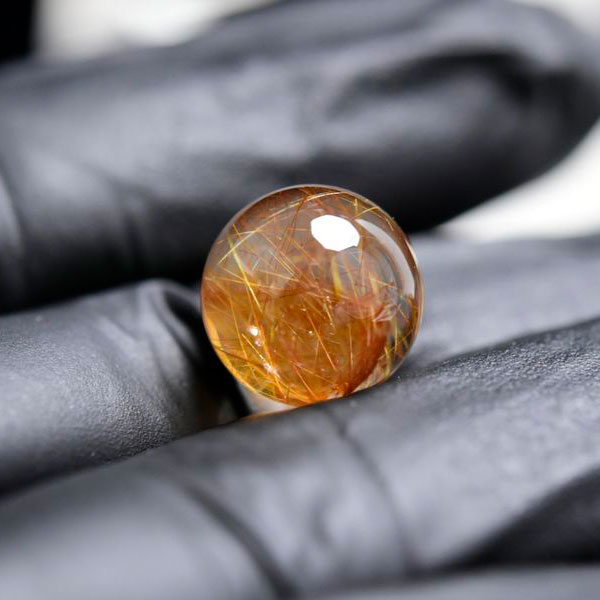 ゴールドルチル　ルチルクォーツ　金針水晶　丸玉　穴なし　金運　財運　スフィア　天然石　パワーストーン