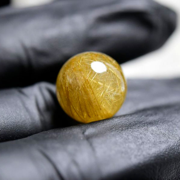 ゴールドルチル　ルチルクォーツ　金針水晶　丸玉　穴なし　金運　財運　スフィア　天然石　パワーストーン