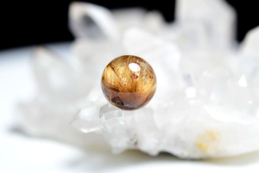 ゴールドルチル　ルチルクォーツ　金針水晶　丸玉　穴なし　金運　財運　スフィア　天然石　パワーストーン