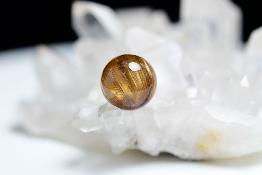 ゴールドルチル　ルチルクォーツ　金針水晶　丸玉　穴なし　金運　財運　スフィア　天然石　パワーストーン