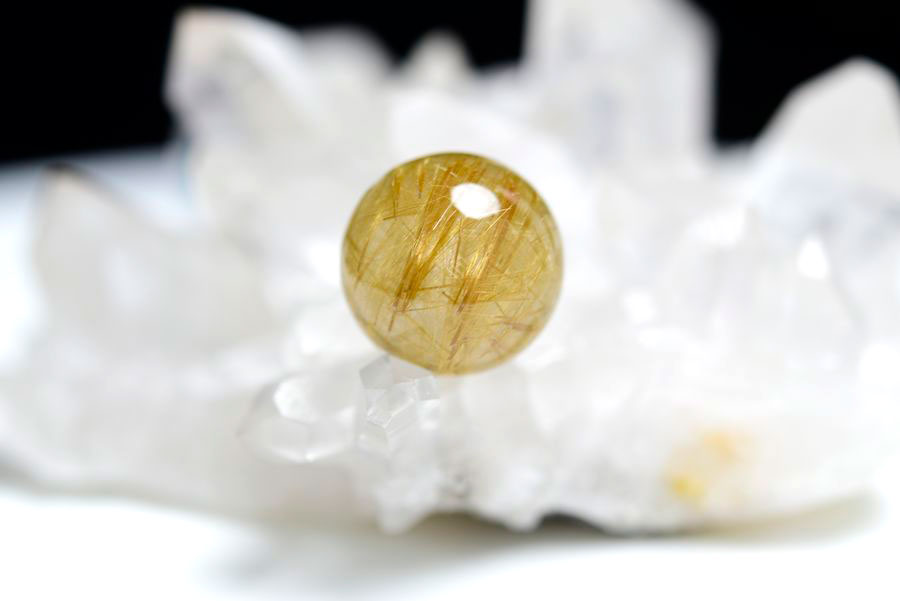 ゴールドルチル　ルチルクォーツ　金針水晶　丸玉　穴なし　金運　財運　スフィア　天然石　パワーストーン
